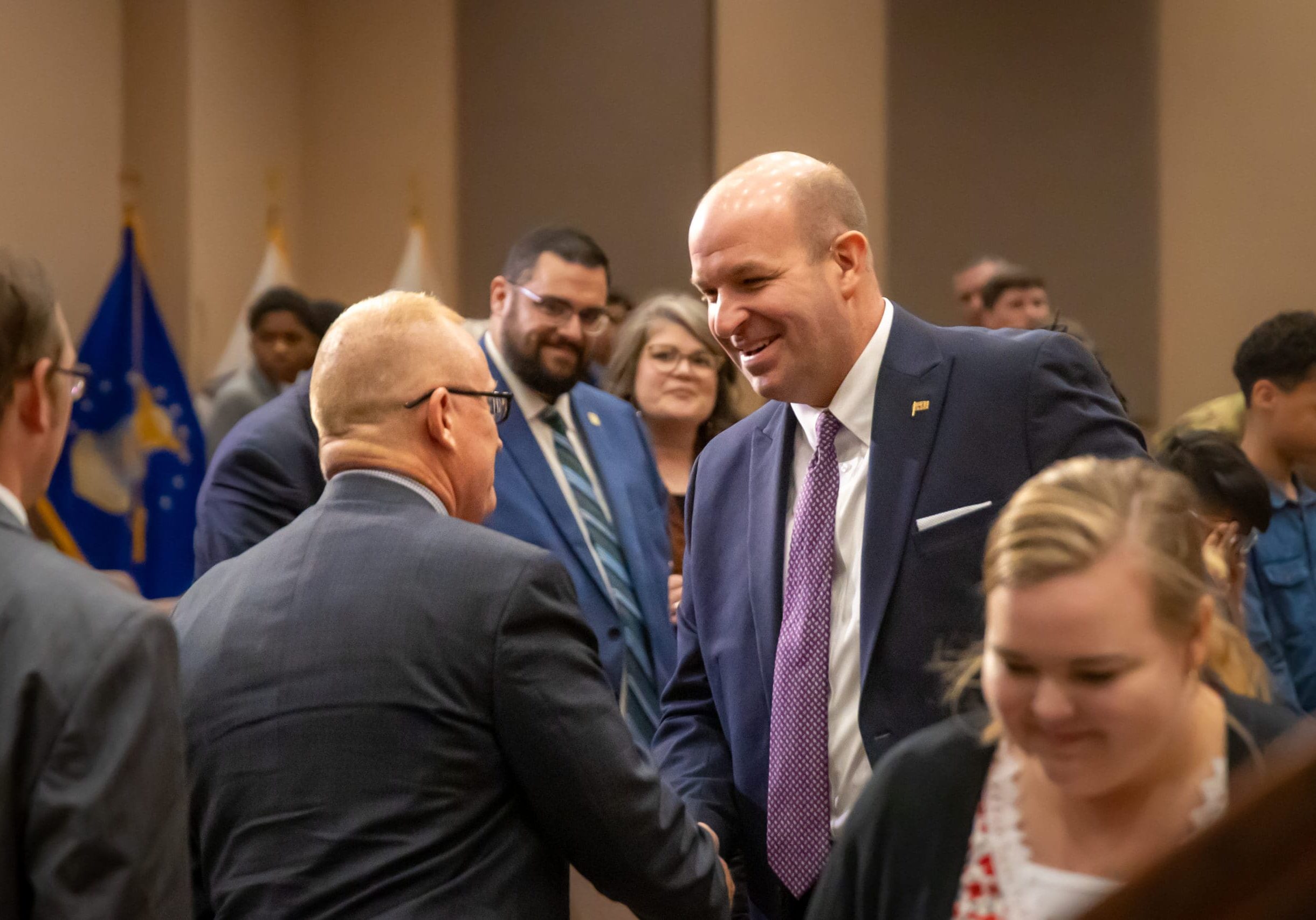 Pastor Shaking Hands