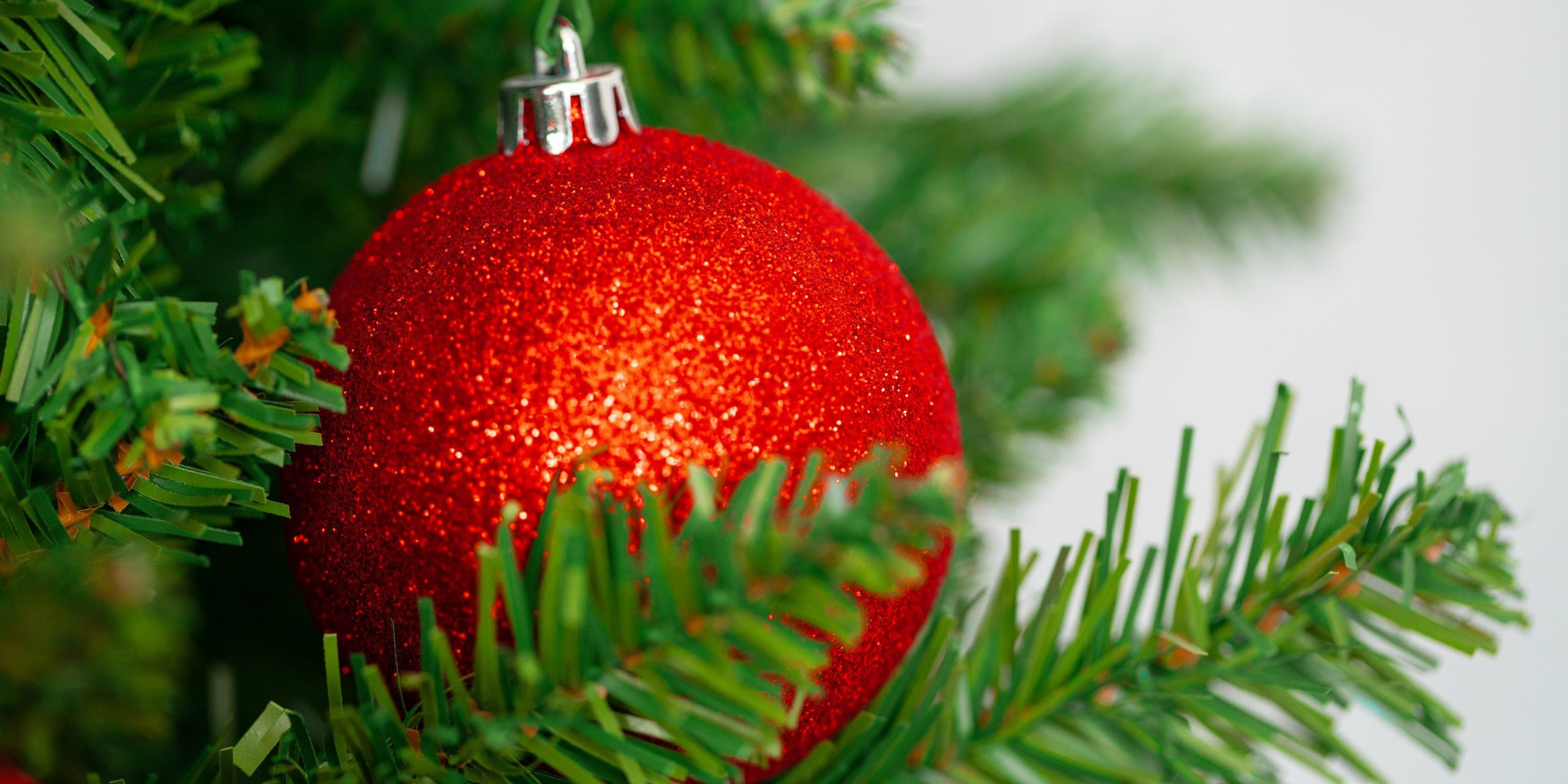 Beautiful Christmas tree with red baubles close up