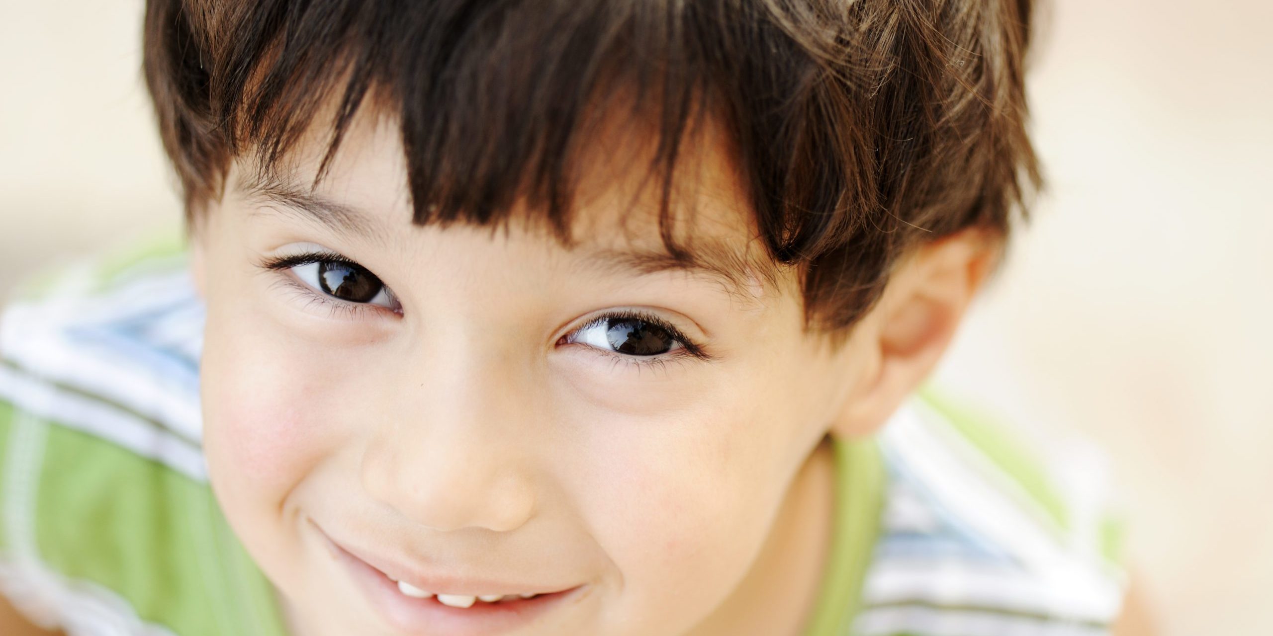 Very cute happy child, positive face, closeup